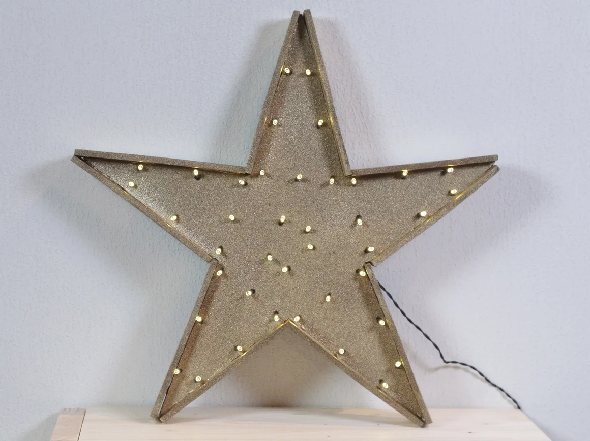 Leuchtender goldener Stern
