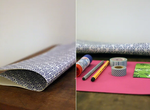 Bastelmaterial: Papier, Klebestift, Stifte, Klebeband und Samentüte
